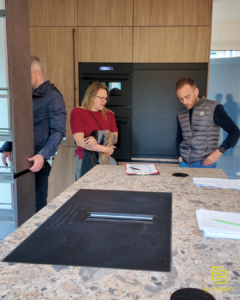 In the kitchen Florent explains details to Catherine